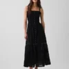 Abito lungo a balze con ricami traforati