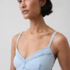 Abito lungo a corsetto con cuciture in denim