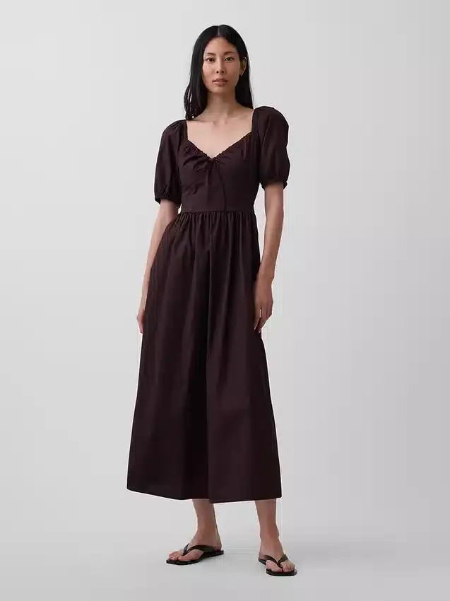 Abito lungo a corsetto con maniche a sbuffo