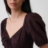 Abito lungo a corsetto con maniche a sbuffo