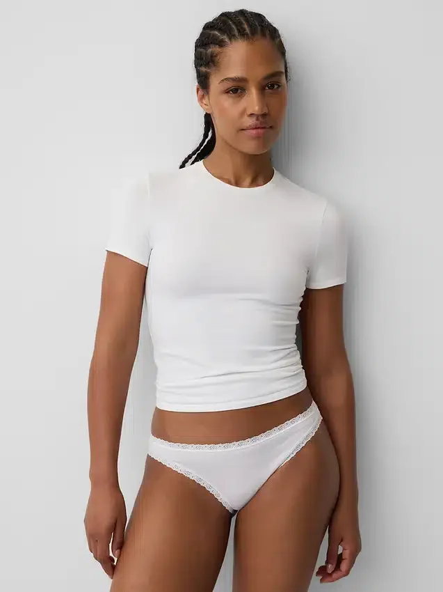 Bikini in cotone biologico elasticizzato con bordi in pizzo