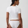 Bikini in cotone biologico elasticizzato con bordi in pizzo