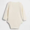 Body in cotone biologico con tasca e logo NYC della linea “Baby First Favorites”