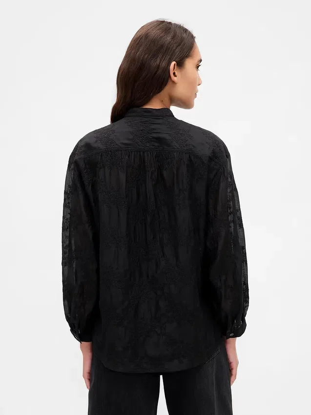 Camicia floreale in voile trasparente