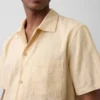 Camicia in cotone dobby dalla linea morbida con orlo dritto
