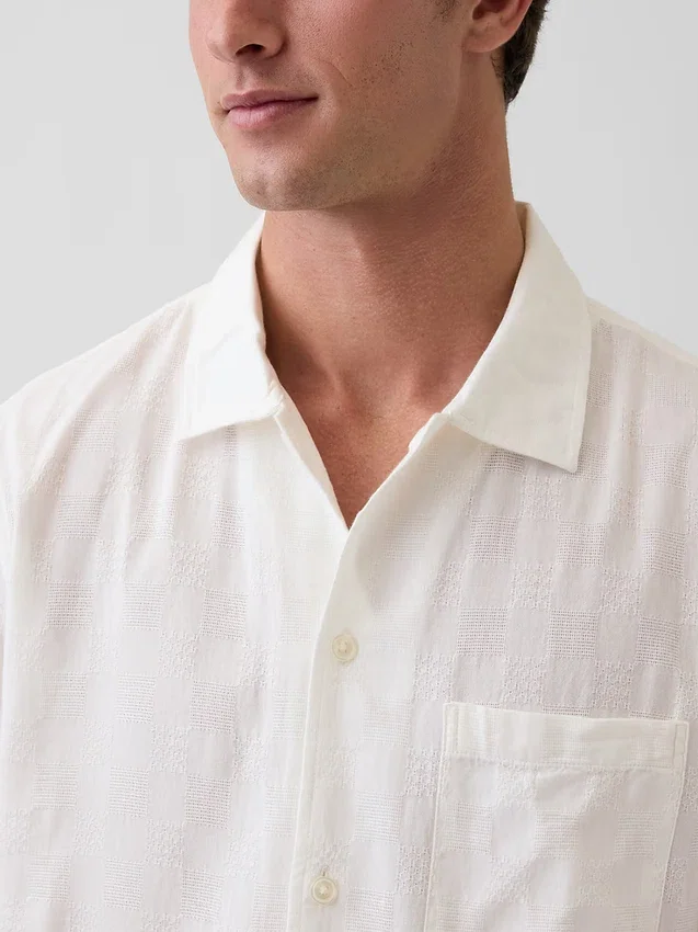 Camicia in cotone dobby dalla linea morbida con orlo dritto
