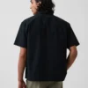 Camicia utility dalla linea morbida con orlo dritto