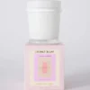 Candela in confezione Mersea Coconut Sugar