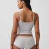 Canotta con reggiseno incorporato in cotone elasticizzato biologico con bordi in pizzo