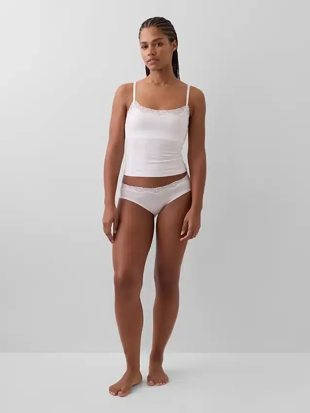 Canotta con reggiseno incorporato in cotone elasticizzato biologico con bordi in pizzo
