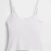 Canotta con reggiseno incorporato in cotone elasticizzato biologico con bordi in pizzo