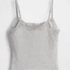 Canotta con reggiseno incorporato in cotone elasticizzato biologico con bordi in pizzo