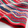 Cappello a secchiello in maglia a righe
