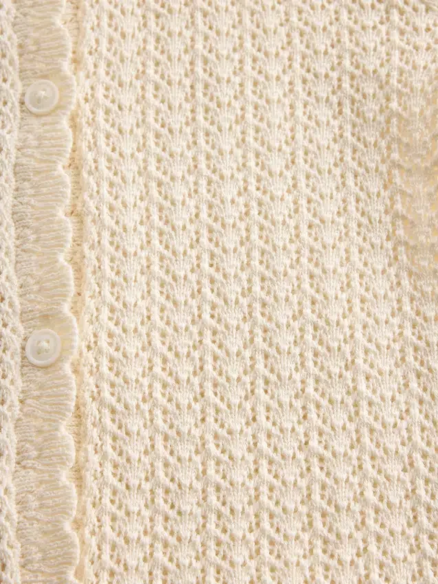 Cardigan all’uncinetto per neonati