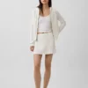 Cardigan con zip in maglia a trecce 100% cotone