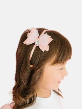 Cerchietto con fiocco glitterato e ciondolo a forma di cuore Sweet Wink
