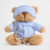 Ciondolo per borsa Brannan Bear a forma di sacco a pelo