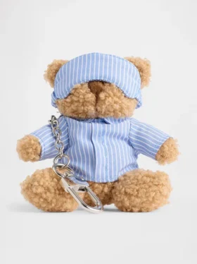 Ciondolo per borsa Brannan Bear a forma di sacco a pelo