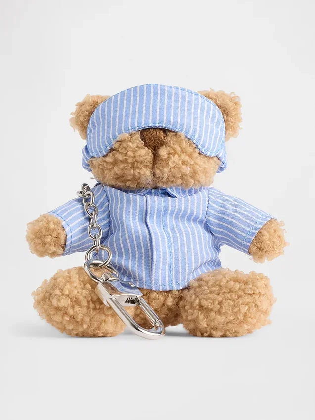 Ciondolo per borsa Brannan Bear a forma di sacco a pelo