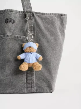 Ciondolo per borsa Brannan Bear a forma di sacco a pelo