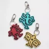 Ciondolo per borsa Keith Haring