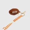 Ciondolo per borsa Shiraleah a forma di pallone da football