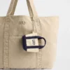 Ciondolo per borsa tote con logo