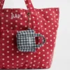 Ciondolo per borsa tote con logo