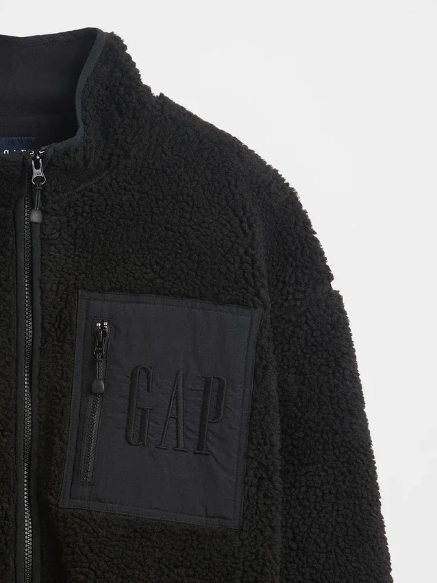 Giacca con zip oversize in sherpa riciclato e logo