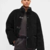 Giacca in sherpa riciclato con rifiniture in pelle vegana