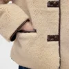 Giacca in sherpa riciclato con rifiniture in pelle vegana
