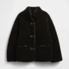 Giacca in sherpa riciclato con rifiniture in pelle vegana