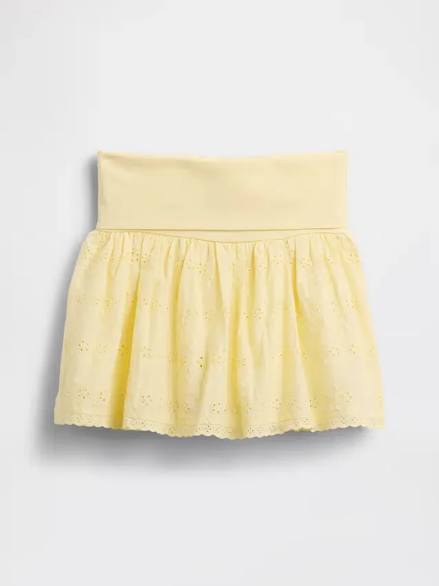 Gonnellina con orlo ripiegato e occhielli per bambini