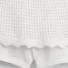 Gonnellina-pantaloncino a balze all'uncinetto per bambini