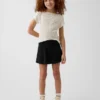 Gonnellina-pantaloncino a risvolto per bambini