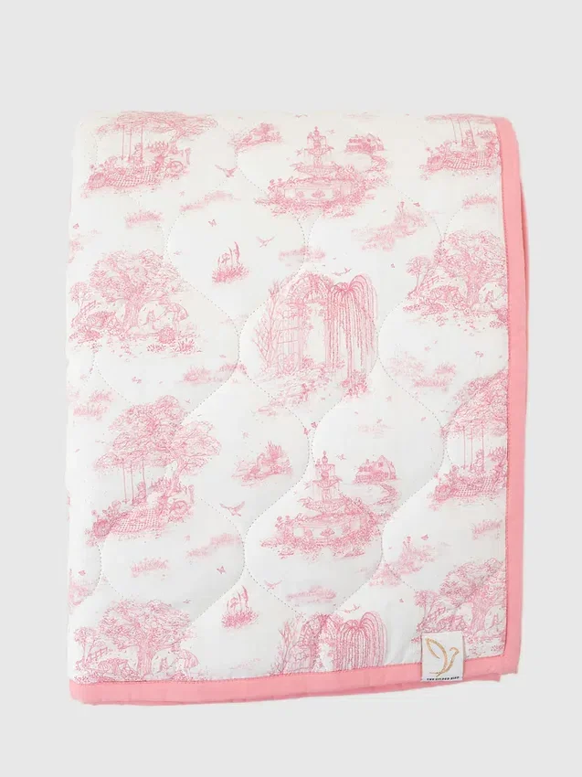 Il tappetino da gioco trapuntato “Gilded Bird Spring Toile”