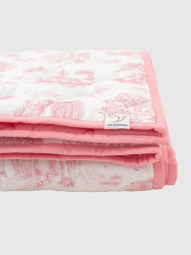 Il tappetino da gioco trapuntato “Gilded Bird Spring Toile”