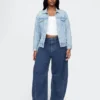 Jeans a cavallina in maglia a vita alta