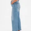 Jeans a gamba larga e caviglia, con vita alta e linea sinuosa