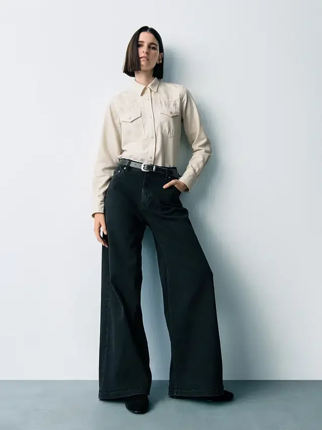 Jeans a vita alta con gamba larga