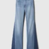 Jeans a vita alta con toppe in stile anni ’70 a zampa