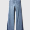 Jeans a vita alta con toppe in stile anni ’70 a zampa
