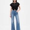 Jeans a vita alta dal taglio ampio e svasato