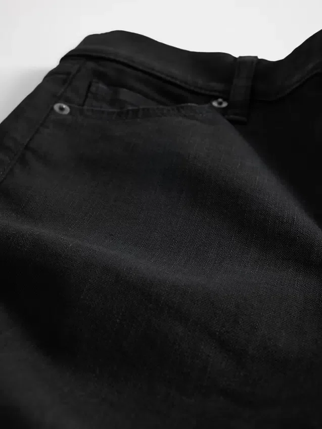 Jeans a vita alta e a zampa larga