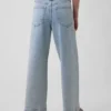 Jeans a vita alta, gamba larga e lunghezza alla caviglia