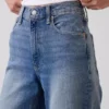 Jeans a vita alta, gamba larga e lunghezza alla caviglia