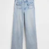 Jeans a vita alta, gamba larga e lunghezza alla caviglia