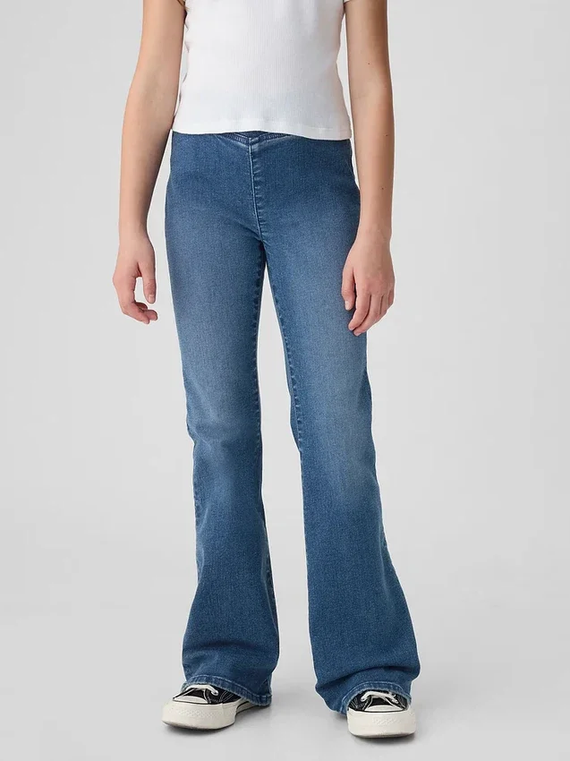 Jeans a vita alta svasati con cintura incrociata per bambini