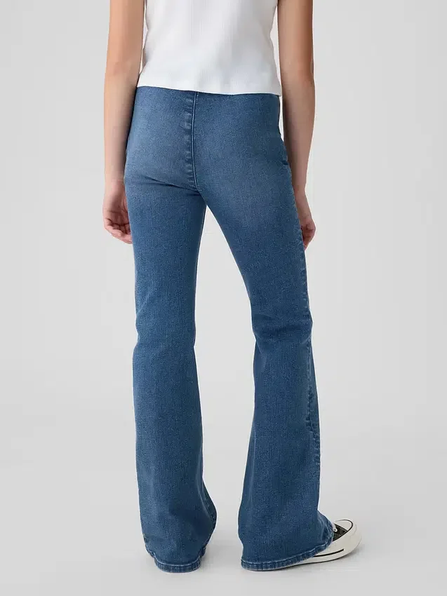 Jeans a vita alta svasati con cintura incrociata per bambini