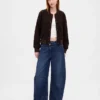 Jeans a vita alta ultrasoft con taglio a ferro di cavallo incrociato